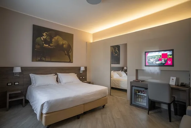 غرفة عائلية رباعية بسرير كوين مع أريكة، Hotel Guerro 1/4