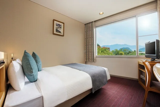 غرفة بسرير مزدوج بحمام خاص، Kamenoi Hotel Fukui 2/3