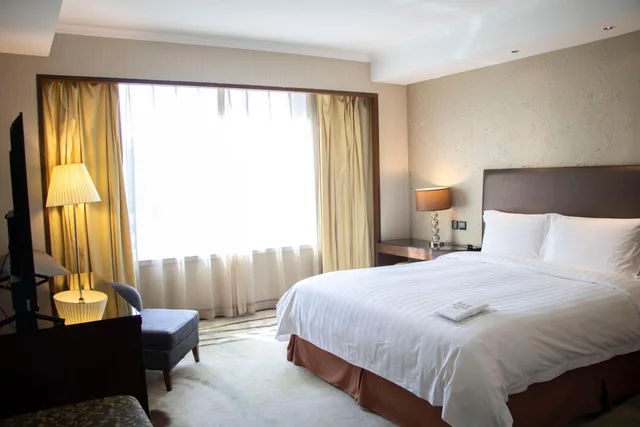 جناح عائلي ديلوكس بسرير كوين وسرير فردي، Grand Mercure Beijing Central 1/3