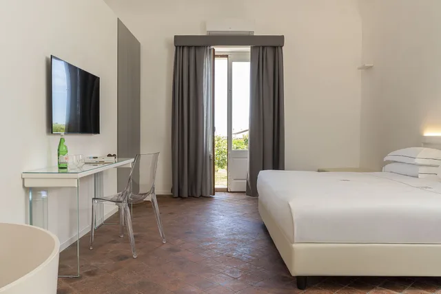 جناح جونيور بسرير كينج مع أريكة بحوض استحمام، Ramo D Aria Etna Boutique Hotel 2/7