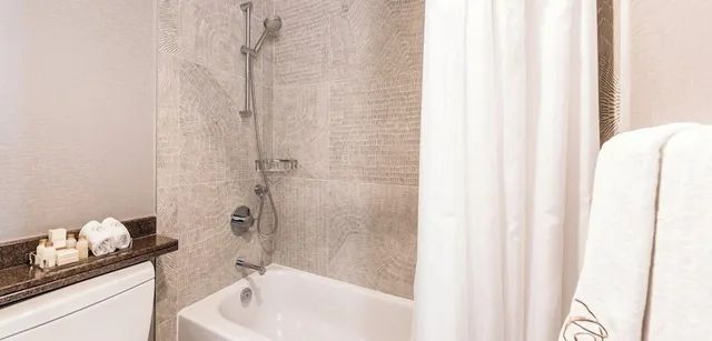 جناح بسرير كينج بغرفة نوم واحدة، Carmana Hotel and Suites 2/3