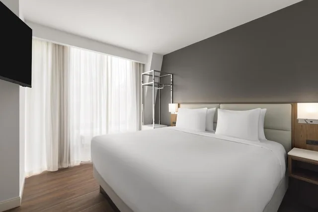 Suite, King Bed, Sofa, Kitchenette, Accessible, Best Western Premier Empire State Hotel 1/3
