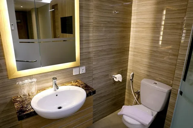 غرفة أساسية مفردة بسرير مزدوج، Grand Citihub Hotel at Panakkukang 1/2