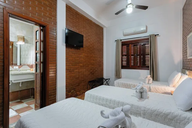 غرفة قياسية ثلاثية بثلاثة أسرّة، Hotel Pira Miuna 1/10