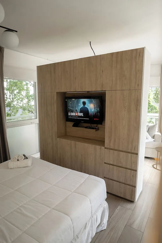 جناح استوديو بسرير كينج مع أريكة، Sucre Suites 1/10