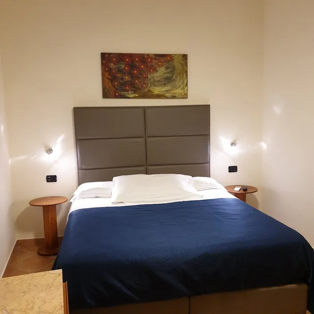 شقة ديلوكس بسرير كينج وسرير كوين بإطلالة على البحر بشرفة بغرفتي نوم مع أريكة، RESIDENCE L INCANTO 1/9