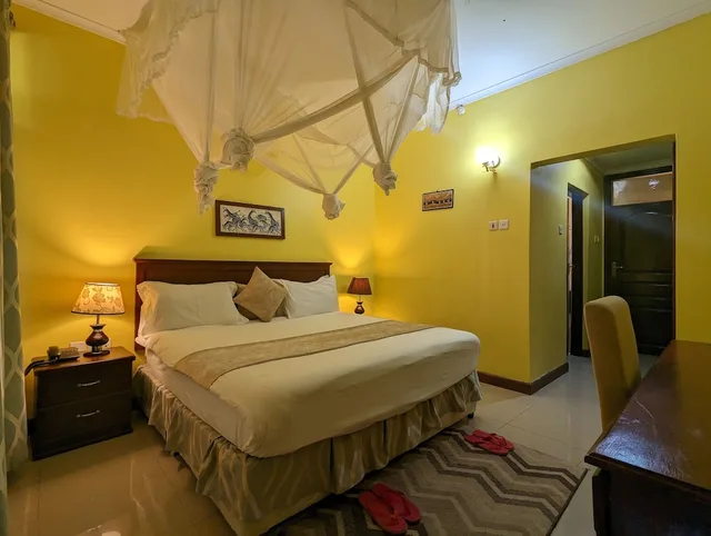 غرفة قياسية بسرير كينج بشرفة، Mvuli Hotel 3/9