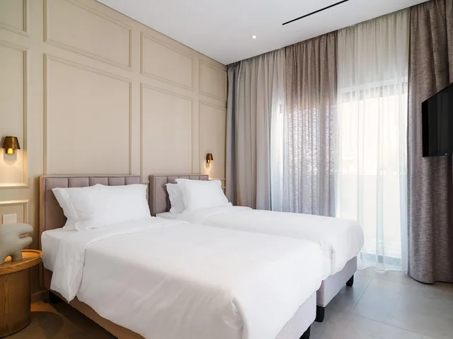 جناح رئاسي بسريرين منفصلين مع أريكة، LIV Mackenzie Beach Suites 2/10