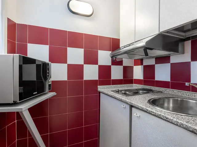 غرفة بسرير مزدوج بمطبخ صغير، iH ApartHotels Milano Argonne Park 7/7