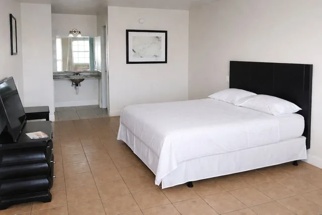 غرفة بسرير كوين لغير المدخنين، Siesta Motor Inn Kissimmee Near Disney World 1/3