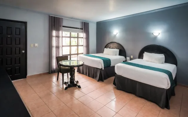 غرفة قياسية بسريرين مزدوجين بإطلالة على الحديقة، InHouse Select Hacienda Tres Rios 7/10