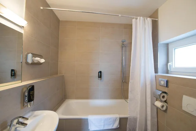 غرفة رباعية بسرير فردي، Goethe Business Hotel 5/7