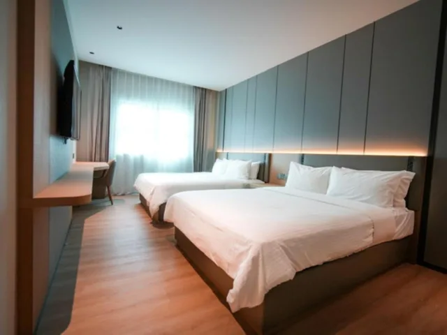 غرفة ديلوكس بسريرين منفصلين، The Inn Formerly Triple Tree Xpress Hotel 1/3