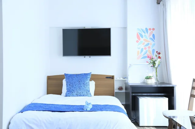 غرفة ثلاثية بسرير مزدوج وسريرين منفصلين في الطابق العلوي، Sakuragawa Riverside Hotel 8/10