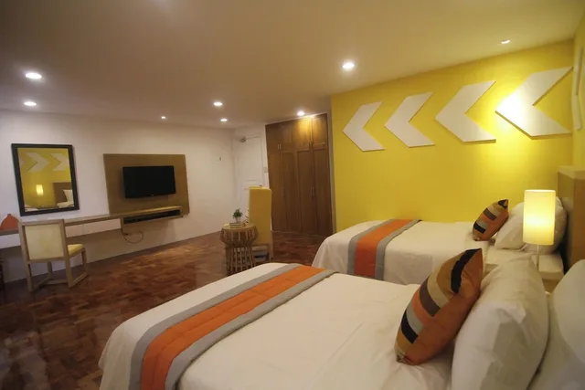 غرفة بسريرين منفصلين، Bryan Condominium Suites 1/6