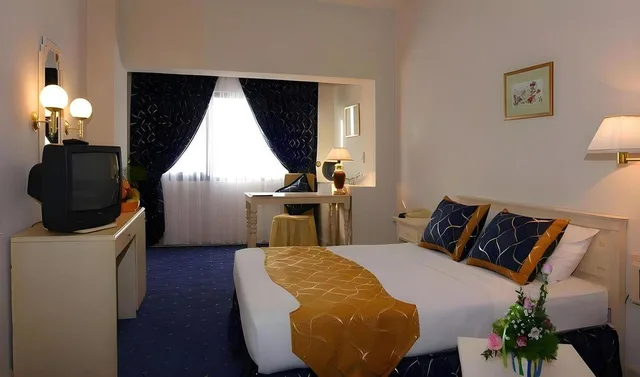 غرفة قياسية بسرير كوين، Le Grande Plaza 1/1