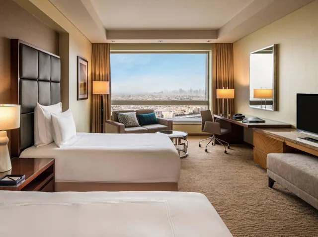 غرفة ديلوكس بسريرين منفصلين، Swissotel Al Ghurair Dubai 1/1