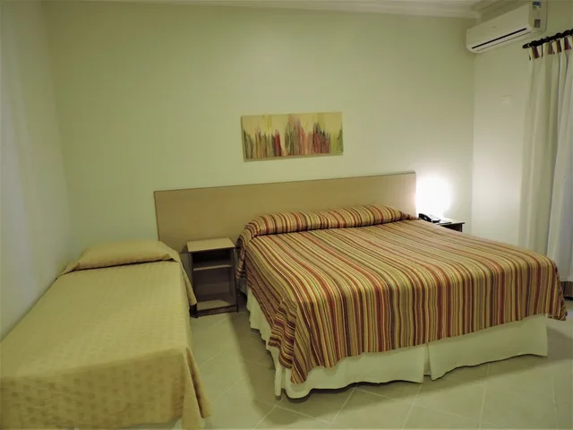 غرفة ديلوكس ثلاثية بسرير مزدوج وسرير فردي، Hotel Costa Balena 1/8