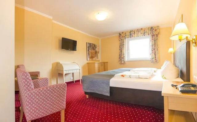 جناح جونيور بسرير كينج مع أريكة، Hotel Schneeberger 3/5
