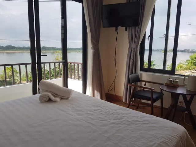 غرفة بسريرين منفصلين بشرفة، Gia Huy Riverside Hotel Hoi An 10/10