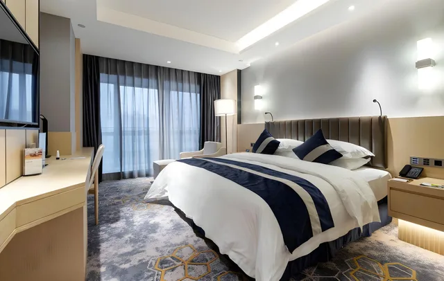غرفة ديلوكس بسرير كينج، Grand Metropark Hotel Liyuan Chongqing 1/2