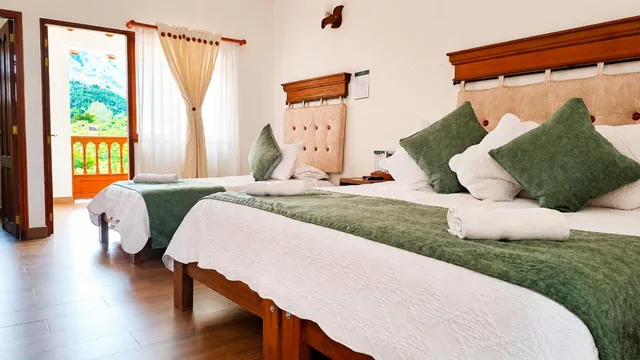 غرفة ديلوكس ثلاثية بسرير كوين وسرير فردي، Hotel Las Palmas Villa De Leyva 8/10