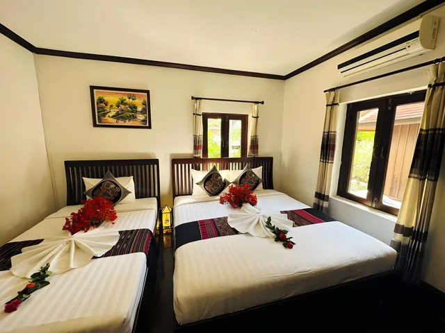 غرفة ديلوكس ثلاثية بسريرين مزدوجين، Thatsaphone Hotel 2/3