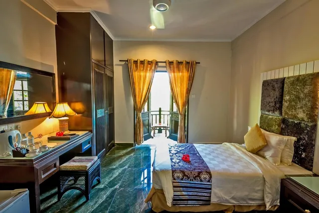 غرفة ديلوكس بسرير مزدوج أو سريرين منفصلين بإطلالة على الحديقة، Beringgis Beach Resort Spa 3/4