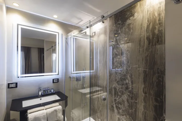 جناح فاخر بسرير كينج وسرير فردي مع أريكة، Unica Suite Rome 7/7