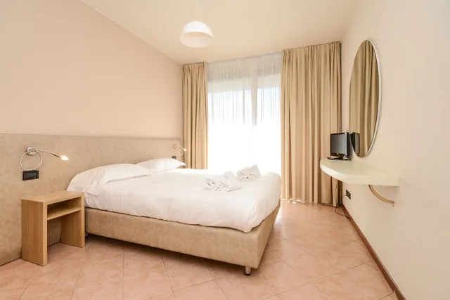 شقة بسرير كينج بإطلالة على الحديقة بغرفة نوم واحدة مع أريكة، Residence Il Sogno 2/5