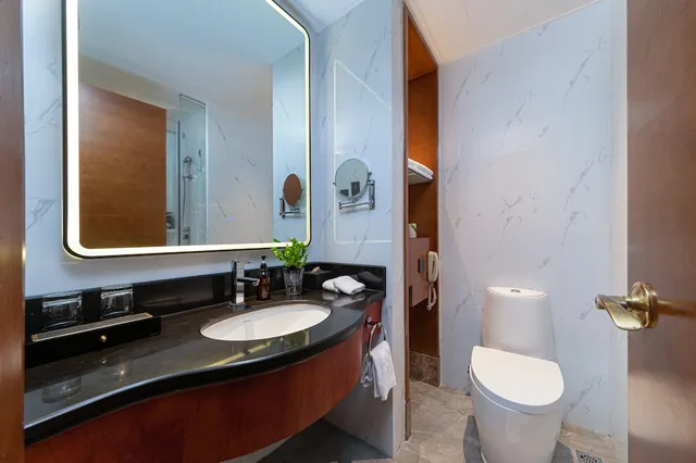 غرفة ديلوكس بسرير كينج، Yihohotel Xiang an Xiamen 4/4