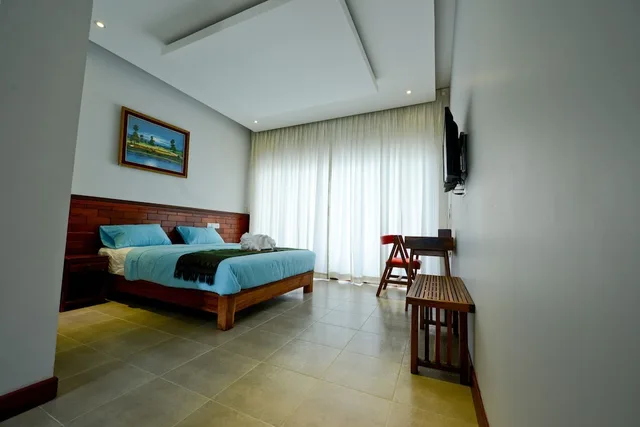 غرفة قياسية بسرير كوين بإطلالة على الحديقة بشرفة، Mowin Boutique Hotel & Residence 2/4