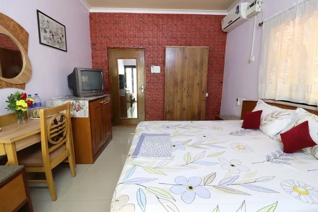 غرفة ديلوكس بسرير كينج بشرفة، Mama Mids Home 8/10
