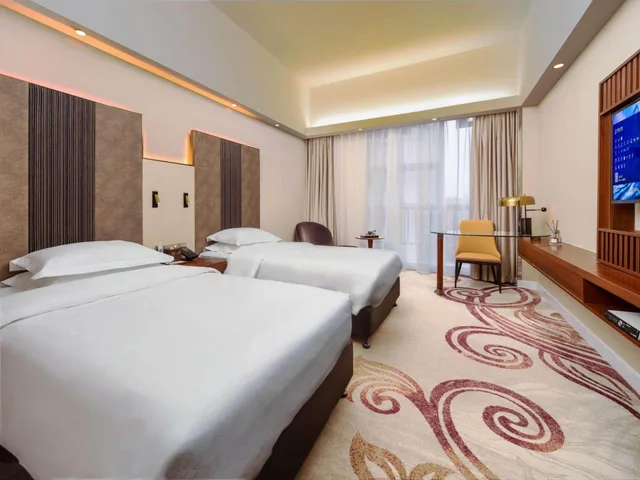 Elegant, Twin Beds، Metropolo Zhenjiang Railway Station Wanda Square 4/7