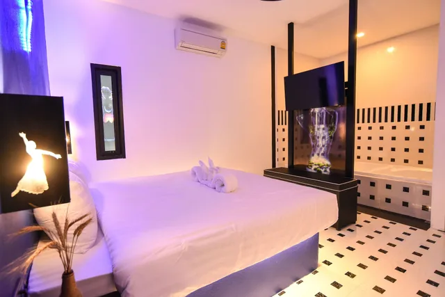 غرفة عائلية رباعية بسريرين كينج بغرفتي نوم بحوض استحمام، Bed Villa Resort Chaing Rai 1/7
