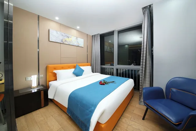 استوديو تنفيذي بسرير كوين، Pengman International Apartment Hotel (Beijing Road Jiedeng Duhui) 2/6