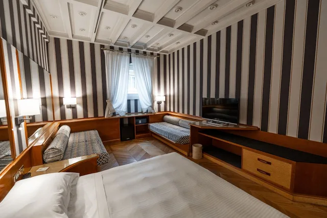 غرفة كلاسيكية رباعية بسرير كوين وسريرين منفصلين، Hotel Sant' Anna 2/10