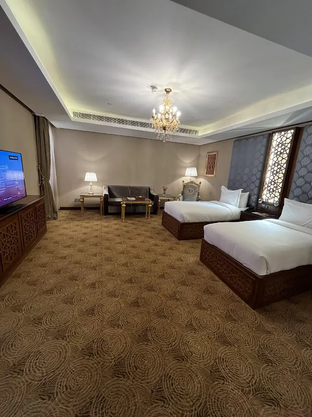 غرفة بسرير كينج مفردة بسريرين منفصلين، فندق الرهدان(Al Rahden Hotel) 1/2