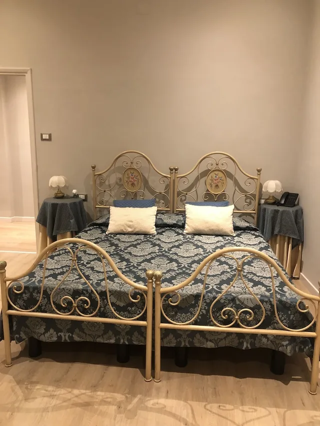 غرفة كومفورت ثلاثية بسرير كوين وسرير فردي بإطلالة على المدينة، Hotel Giappone 5/8