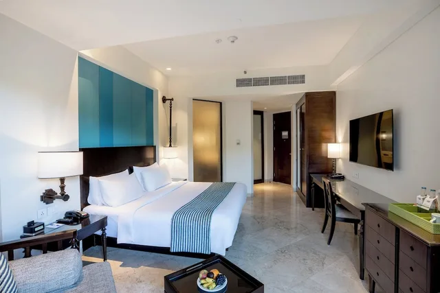 غرفة بريميوم بسرير كينج بإطلالة على المسبح، HOLIDAY INN RESORT BALI BENOA 3/10