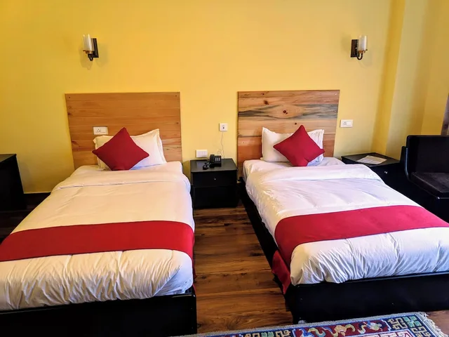 غرفة ديلوكس بسريرين منفصلين بشرفة، Bhutan Silverpine Resort 1/9