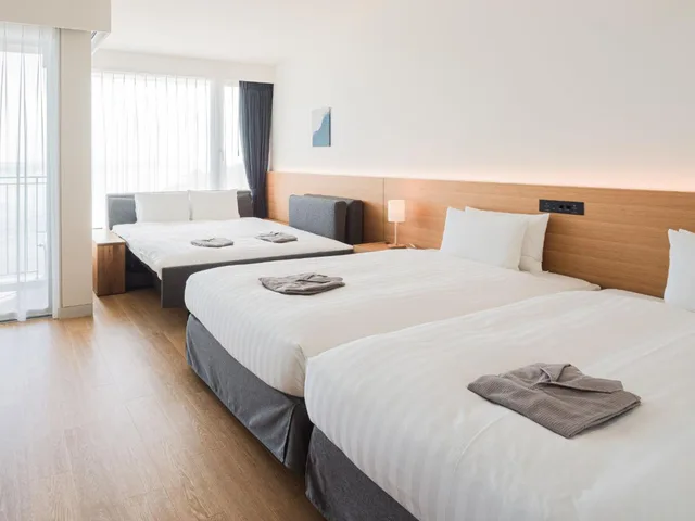 غرفة قياسية بسريرين منفصلين بإطلالة على البحر مع أريكة، Samana Hotel Yakushima 1/3
