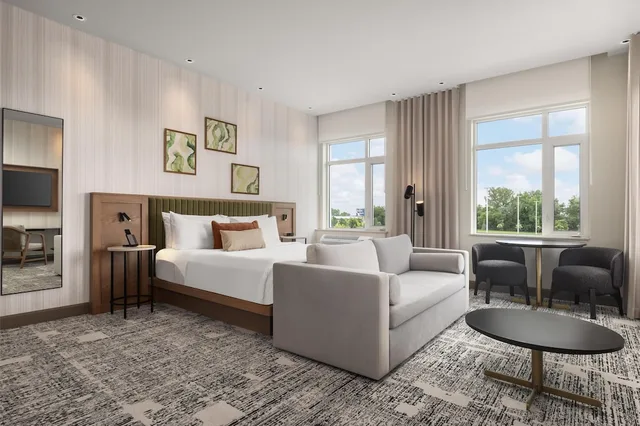 غرفة كومفورت بسرير كينج بمطبخ صغير، Hotel Railwayparc Montreal, Tapestry Collection by Hilton 2/2