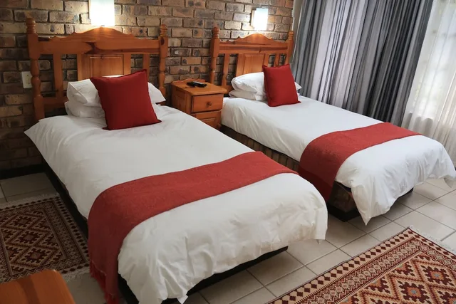 غرفة قياسية بسريرين منفصلين، Shingalana Guest House 1/4