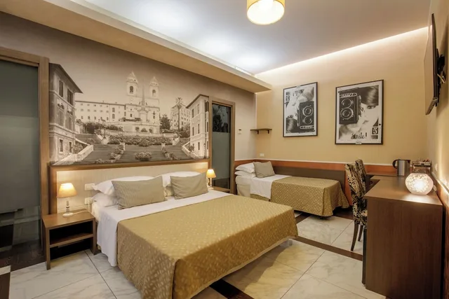 جناح كومفورت بسرير كوين وسريرين فرديين، corso grand suite 5/7