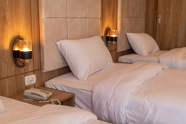 غرفة ثلاثية بثلاثة أسرّة بإطلالة على الحديقة، Nine Pyramids View Hotel 4/6
