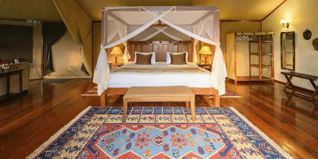 خيمة ديلوكس بسرير كينج بإطلالة على المتنزه بشرفة، OLARE MARA KEMPINSKI MASAI MARA 2/3