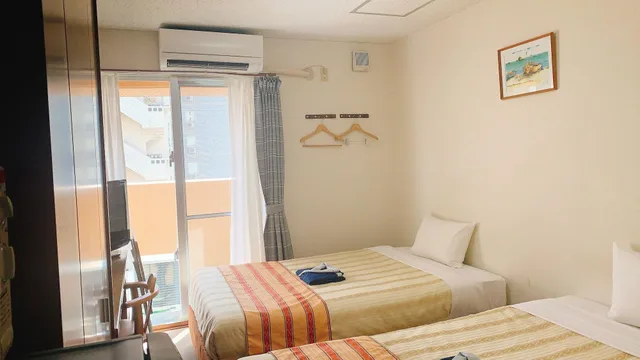 غرفة قياسية بسريرين منفصلين، Hotel Peaceland Kume 1/3
