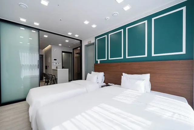 غرفة ديلوكس بسريرين منفصلين، Raviens Haeundae Avenue 2/4
