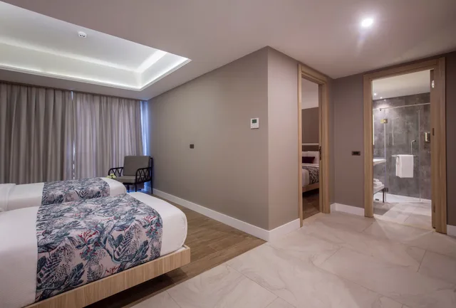 غرفة عائلية ثلاثية بسرير مزدوج وسريرين منفصلين بغرفتي نوم، Woovo Phuket Patong 3/7